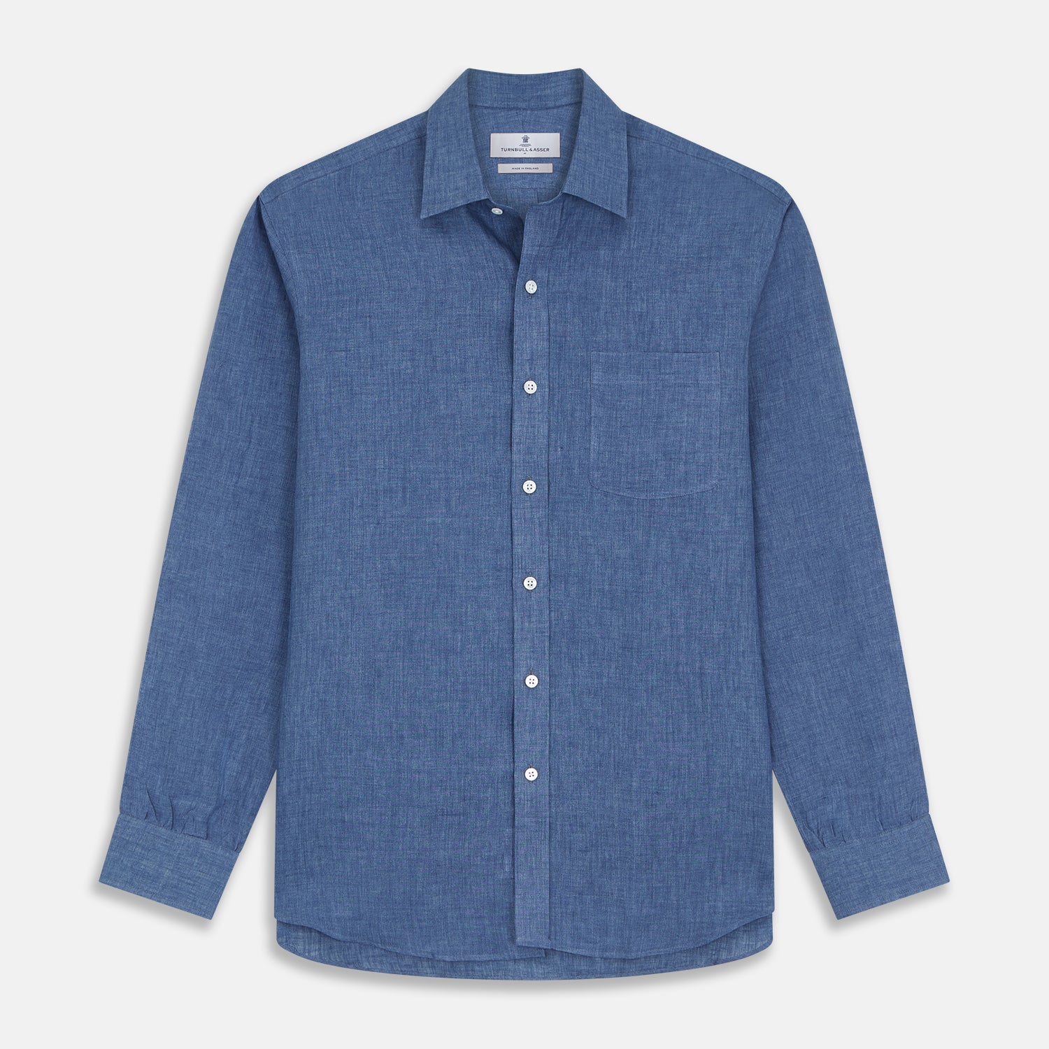 View 1 of product The Blue Weekend Fit Linen Finch Shirt by Turnbull & Asser features a Derby collar, chest pocket, and white buttons. Made from mid-blue linen chambray, it offers effortless casual style when laid flat on a plain white background.