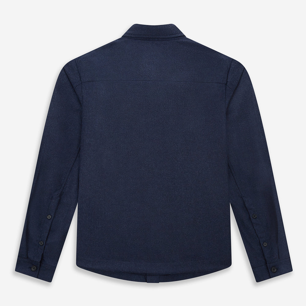 The Turnbull & Asser Mid Blue Highbury Overshirt features long sleeves, a button-up front, collar, and single chest pocket, shown laid flat on a white background.