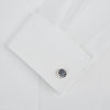 View 3 of product The Turnbull & Asser Navy Spotted Circle Enamel Cufflinks feature round faces with silver polka dots, offering a classic men's accessory in a striking navy design.