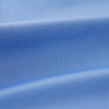 View 4 of product The Turnbull & Asser "The World Is Not Enough" blue cotton Istanbul shirt, as seen on James Bond, is a light blue oxford long-sleeve button-up with a pointed collar and white buttons, displayed on a white background.