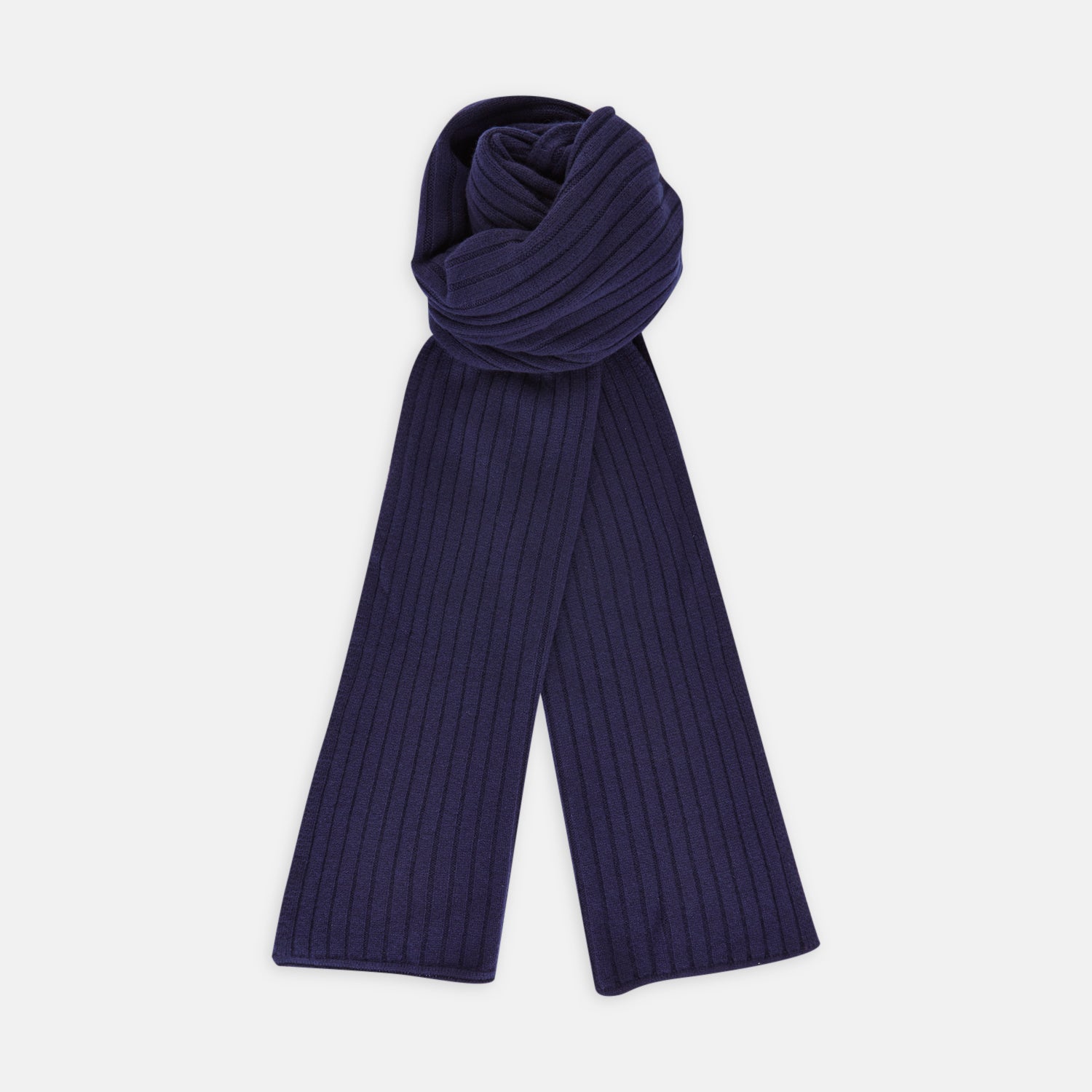 View 1 of product The Turnbull & Asser Navy Wide Rib Cashmere/Wool Scarf is neatly folded with both ends hanging down, set against a plain white background.
