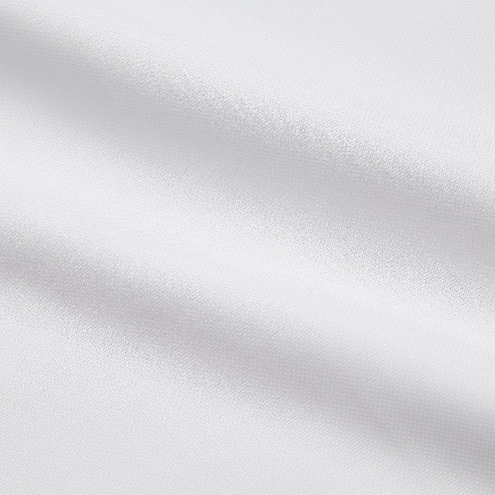 View 2 of product The Turnbull & Asser White Cotton Voile Regular Fit Mayfair Shirt features long sleeves, a pointed collar, button-down front, and buttoned cuffs, displayed flat against a plain white background.