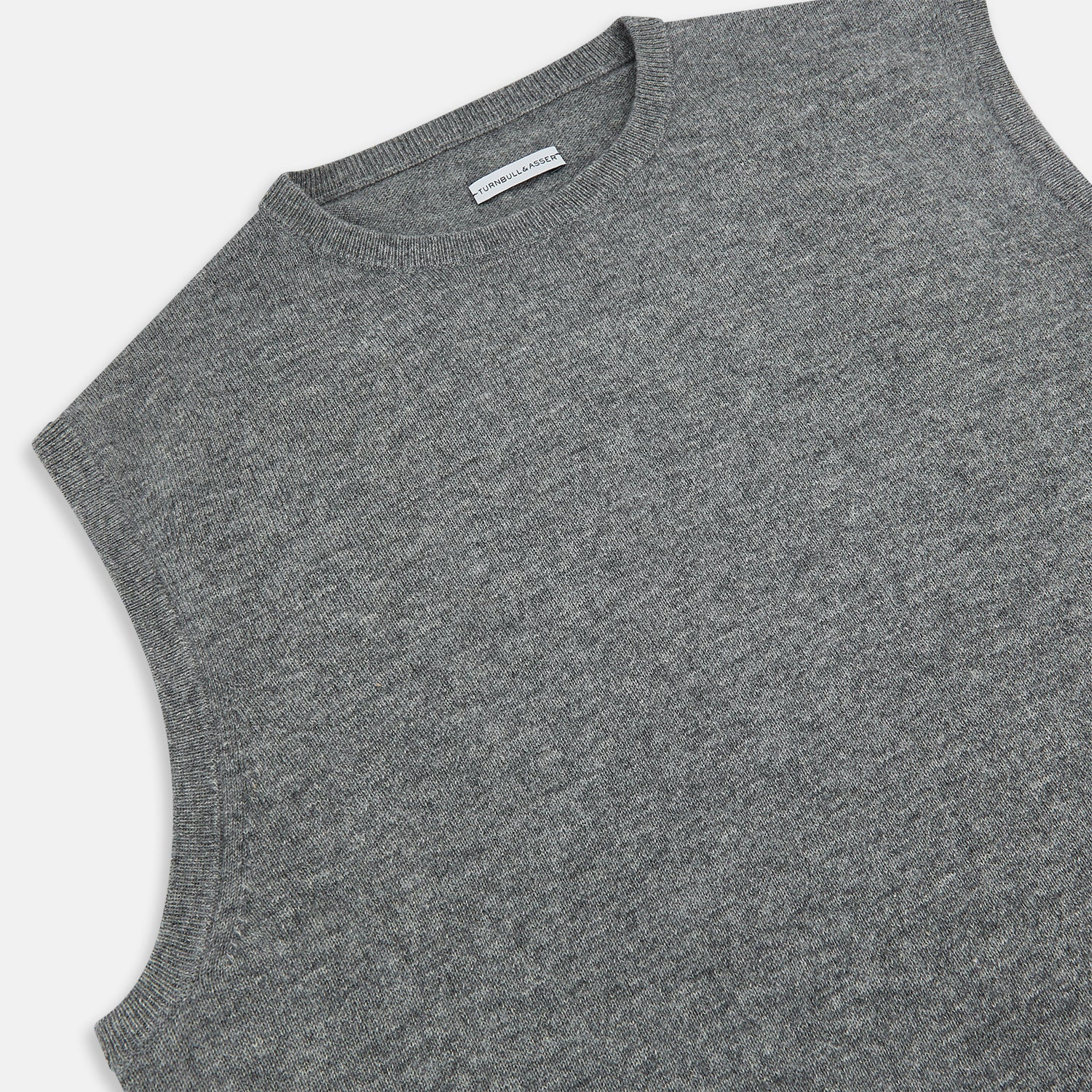 View 2 of product The Turnbull & Asser Ash Grey Cashmere Round Neck Vest is a men's sleeveless knit with a classic crew neckline, shown against a plain white background.