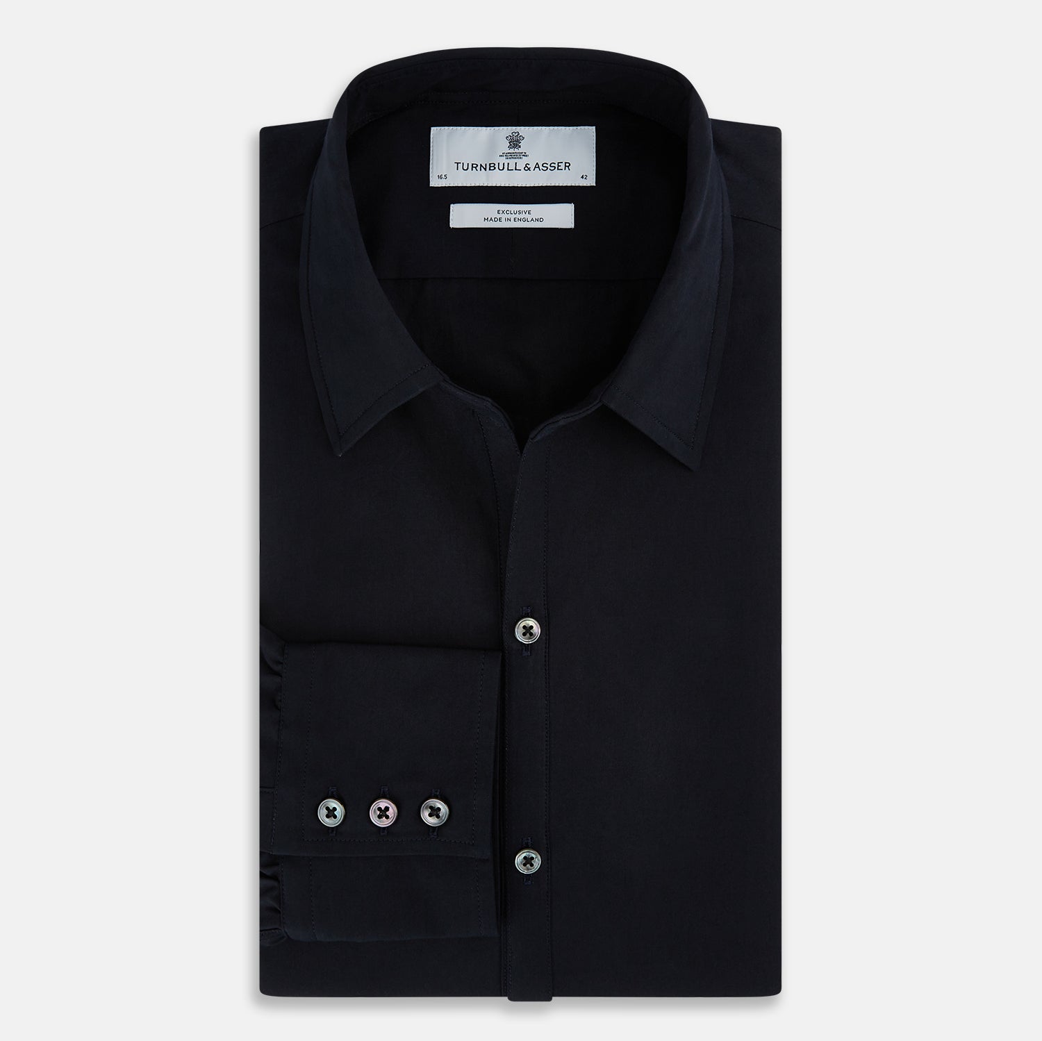 View 5 of product The DARK NAVY WINDSOR SHIRT by Turnbull & Asser is a long-sleeve shirt with a refined Windsor collar, showcasing classic British craftsmanship.