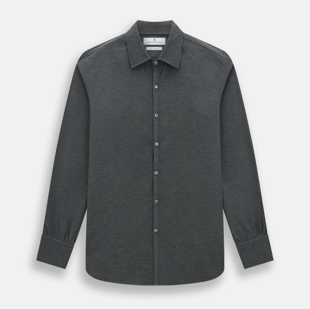 The Charcoal Melange Westminster Shirt by Turnbull & Asser features a long-sleeve, button-up design with a Turnbull collar and buttoned cuffs, offering classic British craftsmanship in a timeless style.