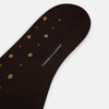 View 3 of product A single Turnbull & Asser Coffee Patterned Mid-Length Sock is shown on a plain white background, featuring brown Egyptian cotton with small yellow and orange dots.