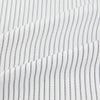 View 6 of product The Navy Music Stripe Mayfair Shirt by Turnbull & Asser features thin vertical blue and white stripes, a classic T&A collar, and long sleeves, shown on a plain white background.