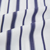 View 5 of product The Turnbull & Asser Navy Double Stripe Quarzo Nightshirt, a knee-length Italian cotton nightshirt with navy and white vertical stripes, collar, chest pocket, and button-down front, is displayed flat on a white background.