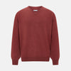 View 1 of product The Turnbull & Asser Burgundy Crew V-Neck Cashmere Jumper is a long-sleeve knitwear piece with ribbed cuffs, hem, and neckline, shown on a white background.
