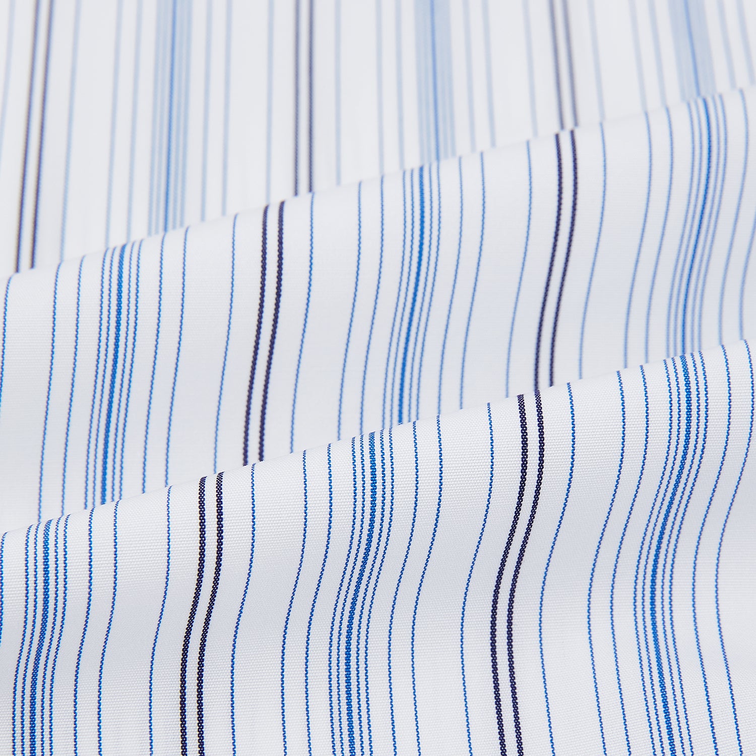 View 6 of product The Turnbull & Asser Navy and Blue Multi Stripe Shirt with Contrast Collar and Double Cuffs is shown in a Mayfair fit on a plain white background.