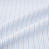 View 6 of product The Turnbull & Asser Pale Blue and Navy Grid Check Shirt features a contrast T&A collar and cuffs, long sleeves, and a button-down front, all displayed on a plain white background.
