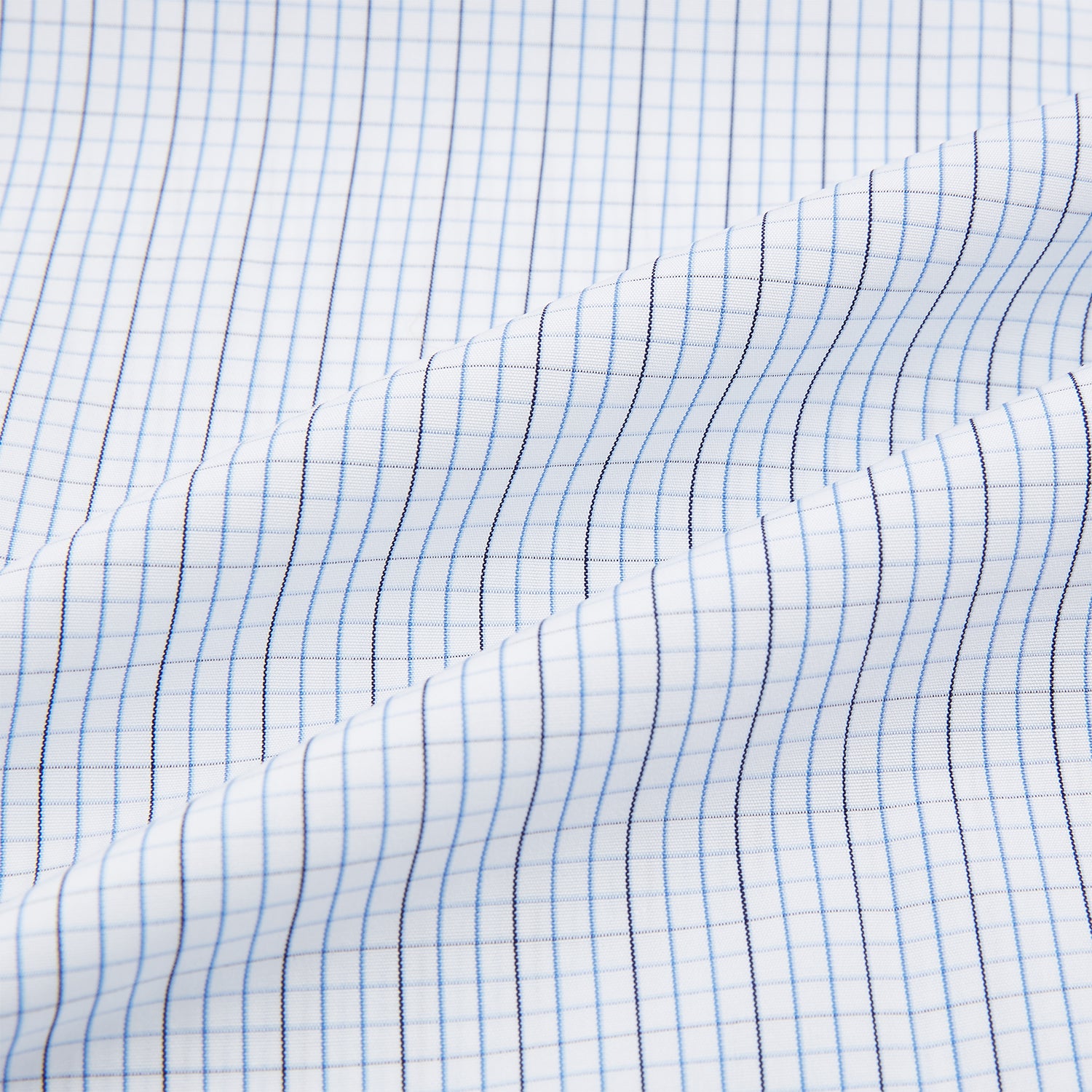 View 6 of product The Turnbull & Asser Pale Blue and Navy Grid Check Shirt features a contrast T&A collar and cuffs, long sleeves, and a button-down front, all displayed on a plain white background.