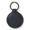 View 2 of product The Dark Navy Leather Fob Holder by Turnbull & Asser features round, dark blue leather with subtle embossed branding and a metallic key ring.