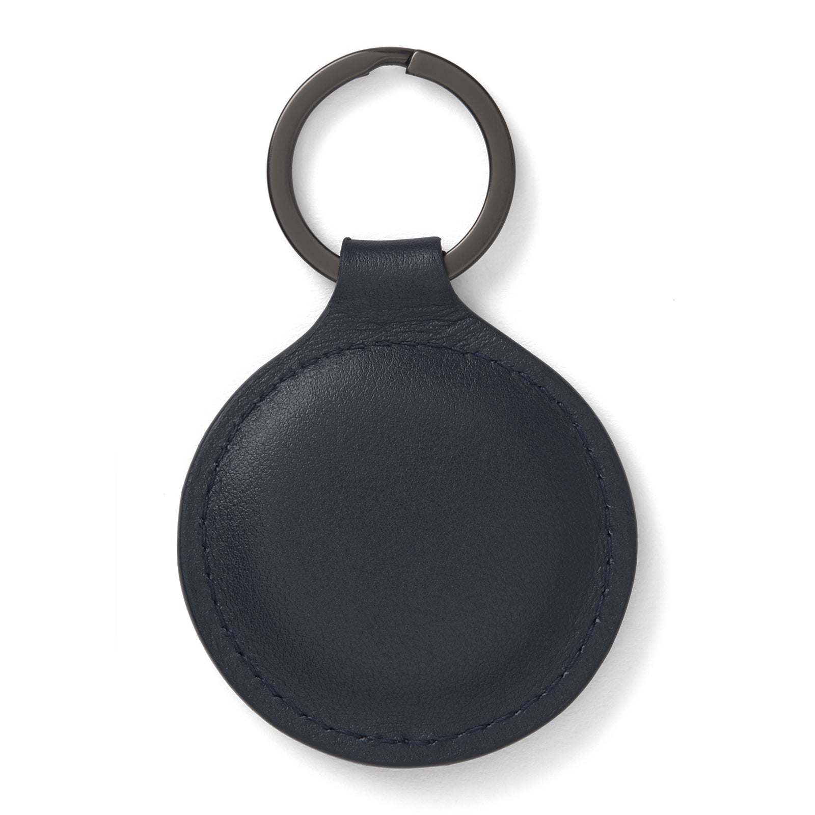 View 2 of product The Dark Navy Leather Fob Holder by Turnbull & Asser features round, dark blue leather with subtle embossed branding and a metallic key ring.
