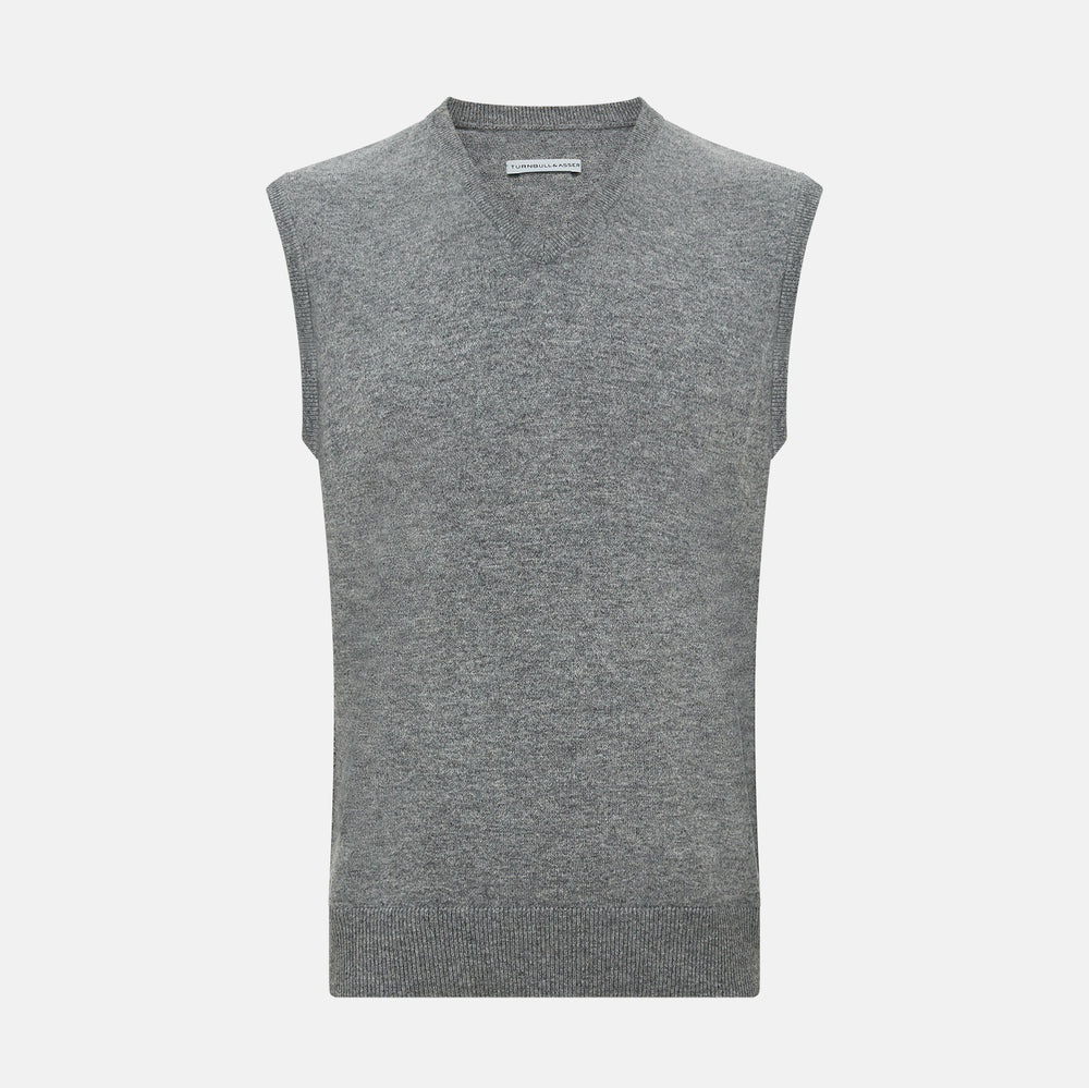 Turnbull & Asser's Grey Melange V-neck Cashmere Vest features classic ribbed trim at the neck, armholes, and hem—an elegant addition to any gentleman’s wardrobe, shown here against a plain white background.