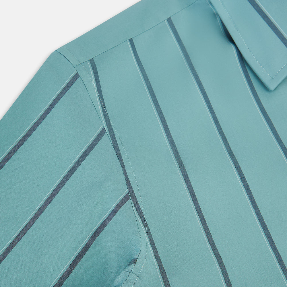 The Turnbull & Asser Sage Track Stripe Westminster Shirt features long sleeves, a tailored fit, a collar, and vertical dark blue stripes, with button closures down the front and at the cuffs, shown laid flat on a white background.