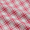 View 5 of product The Turnbull & Asser Red Check Cotton Weekend Fit Finch Shirt is a men's long-sleeved, button-up shirt with a Derby collar and red-and-white plaid pattern, displayed flat on a white background.