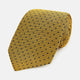 The Turnbull & Asser Purple and Yellow Micro Dot Silk Tie, featuring a refined micro-dot pattern, is a timeless men's accessory.