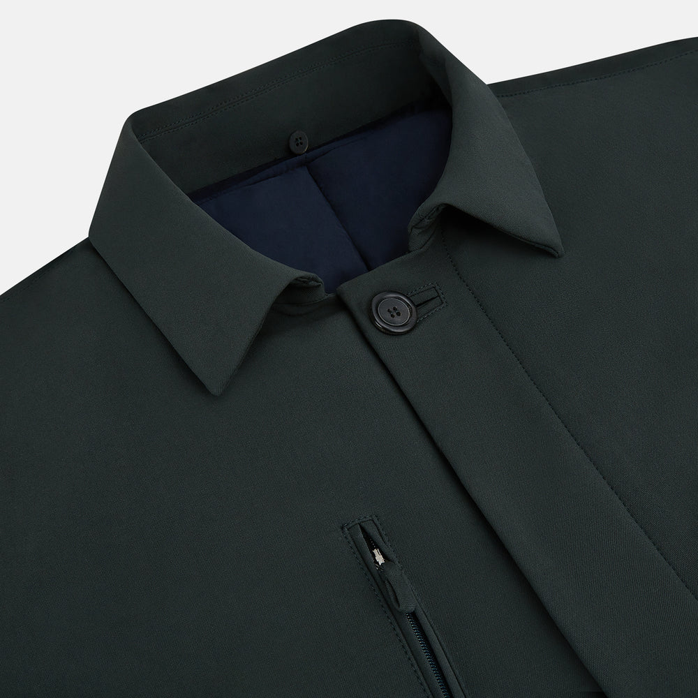 A Forest Green John Arthur Trench Coat by Turnbull & Asser, knee-length with a single-breasted button closure, three zippered pockets, and buttoned cuffs, is laid flat on a white background.