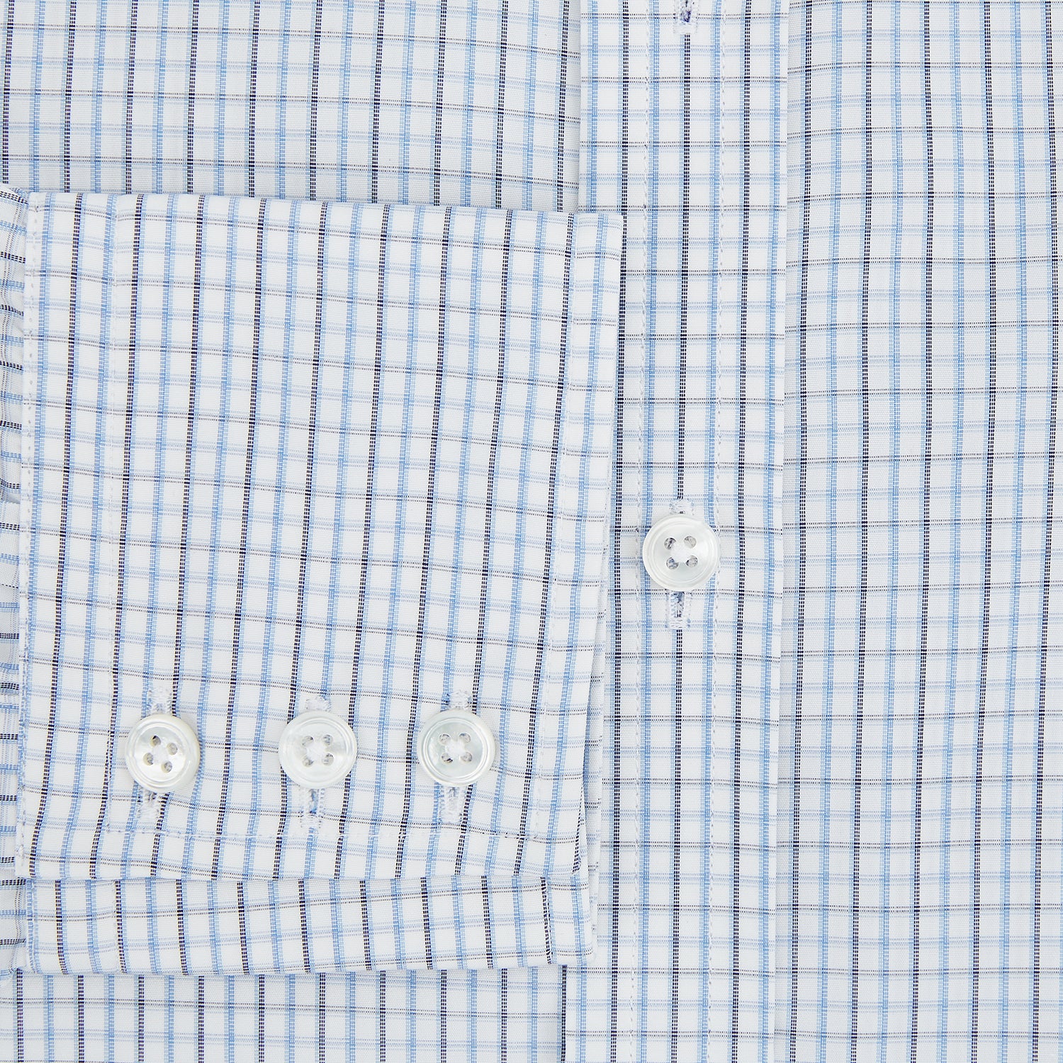 View 4 of product The Turnbull & Asser Navy and Blue Multi Check Mayfair Shirt features a T&A collar, button cuffs, and a blue checkered pattern. This long-sleeve, button-up shirt is shown on a white background.