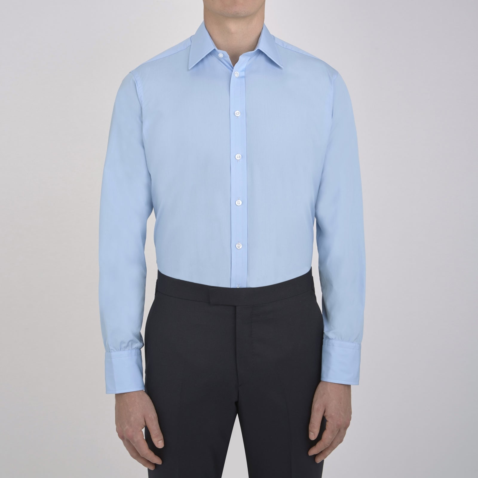 View 5 of product A Light Blue Cotton Shirt with a T&A collar and 3-button cuffs by Turnbull & Asser is displayed on a plain white background, ideal for pairing with a navy suit.