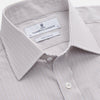 View 3 of product The Turnbull & Asser Sandstone Multi Stripe Cotton Regular Fit Mayfair Shirt, featuring long sleeves, button-up front, chest pocket, and classic collar with subtle white and light gray vertical pinstripes, is laid flat on a white background.