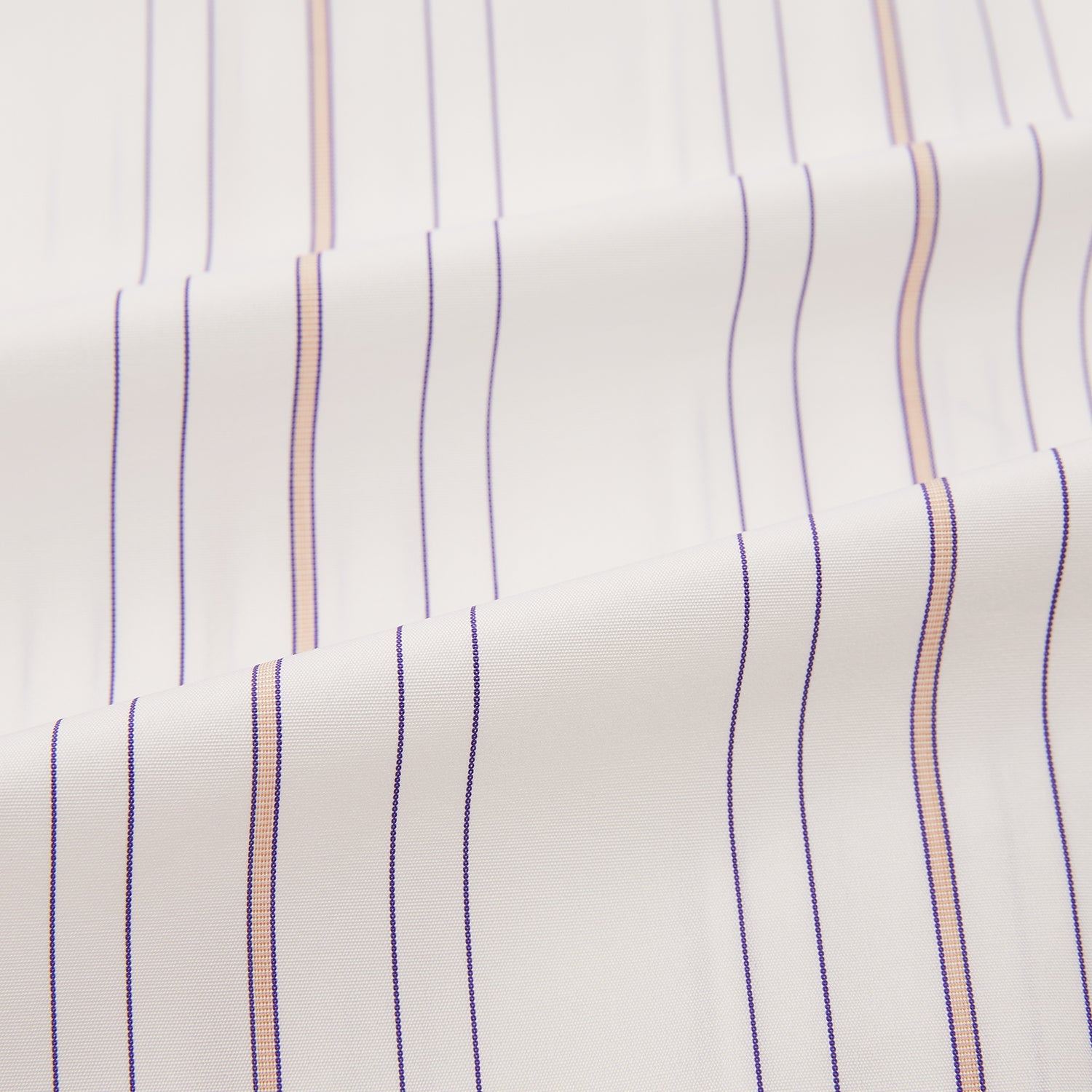 View 6 of product The Purple and Rose Multi Stripe Mayfair Shirt by Turnbull & Asser features thin blue, red, and gray stripes on white, a classic collar, and long sleeves. This British design is displayed on a plain white surface.