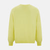 View 3 of product The Turnbull & Asser Bright Yellow Cashmere V-neck Jumper, a plain long-sleeved knitwear sweater, is showcased against a white background.