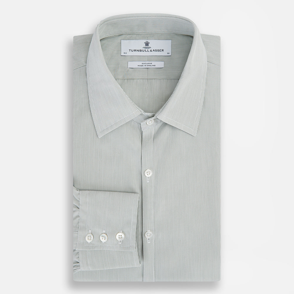 A dark green hairline stripe Westminster shirt by Turnbull & Asser, featuring long sleeves, a classic collar, tailored fit, white front buttons, and buttoned cuffs, laid flat on a white background.