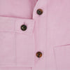 View 4 of product The Pink Hyde Overshirt by Turnbull & Asser is a long-sleeved, light pink sanforised cotton shirt with a left chest pocket and dark buttons—an elegant, laid-back alternative to a blazer.