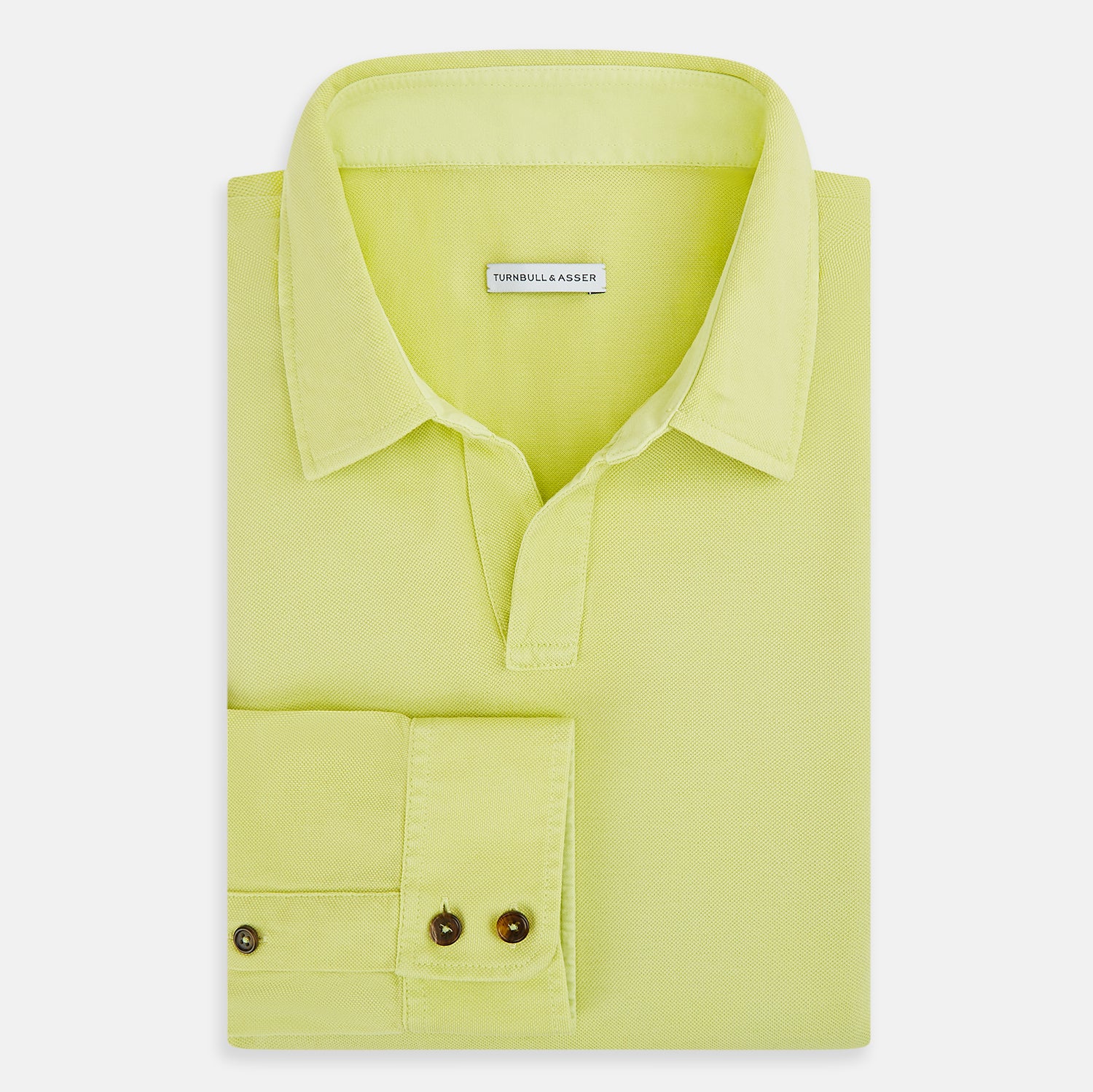 View 5 of product The Turnbull & Asser Lime Green Rugby Polo Shirt is a pure cotton, long-sleeve shirt with a collar and no visible buttons, displayed flat against a white background.