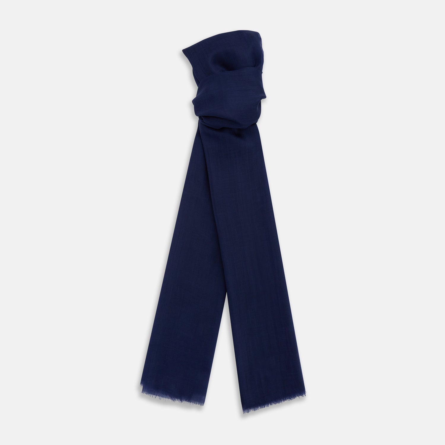 View 1 of product The Turnbull & Asser Navy Cashmere Scarf features a subtle texture and frayed edges, loosely knotted at the top and displayed against a plain white background.