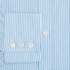 View 4 of product The Turnbull & Asser Blue Bengal Stripe Mayfair Shirt features light blue and white vertical stripes, a classic T&A collar, white buttons, and buttoned cuffs. Laid flat on a white background.