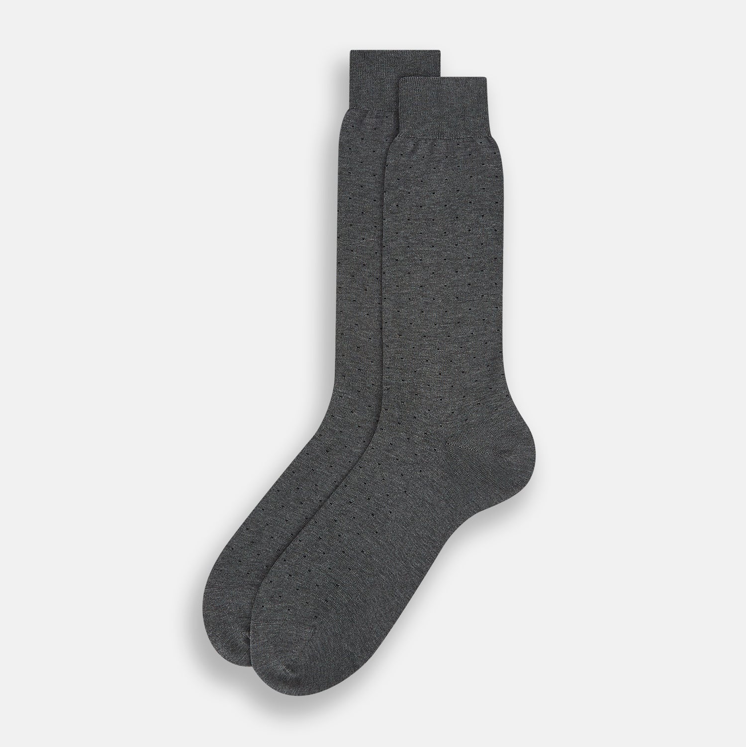View 2 of product The image shows a single Turnbull & Asser Dark Steel/Navy Polka Dot Mid-Length Sock standing upright on a plain white background, featuring a ribbed cuff and a smooth, seamless finish.