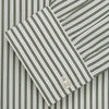 View 5 of product The Turnbull & Asser Green Stripe Weekend Fit Shirt features a derby collar, 1-button cuffs, and relaxed fit, perfect for smart-casual style, shown laid flat on a white background.