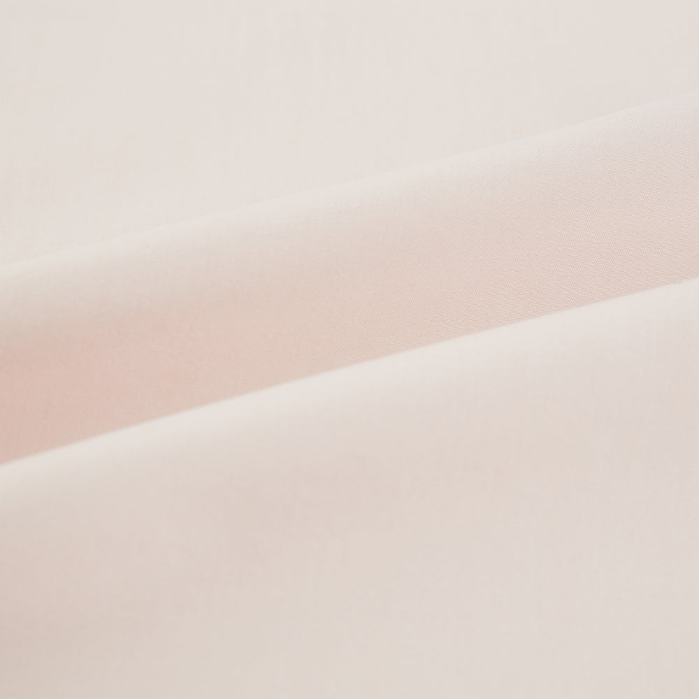 A plain, long-sleeve Pale Pink Mayfair Shirt by Turnbull & Asser with a T&A collar and buttoned cuffs, laid flat on a white background.