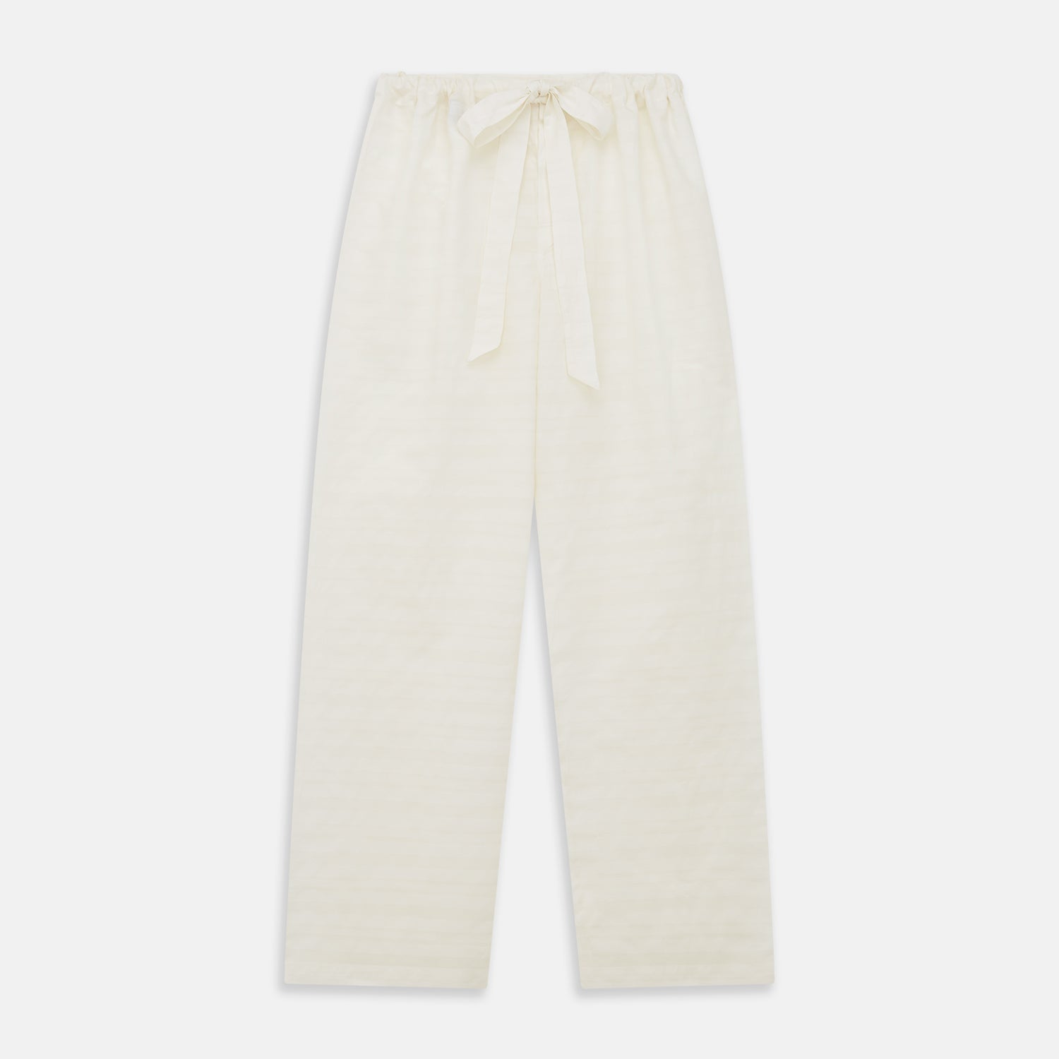 View 4 of product The Cream Pattern Cotton Blend Quin Pyjama Set by Turnbull & Asser features cream stripes, a long-sleeve button-up camp collar shirt with a chest pocket and black piping, and matching drawstring pants.