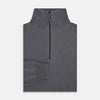 View 4 of product The Turnbull & Asser Grey Half-Zip Cashmere Jumper features long sleeves, a high collar, and premium yarn in dark gray. This classic knitwear is showcased against a white background.