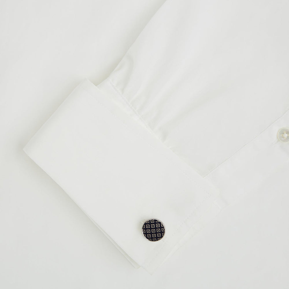 Turnbull & Asser Blue Lattice Circle Cufflinks: sterling silver round cufflinks with a navy blue and white square pattern, shown on a plain white background.