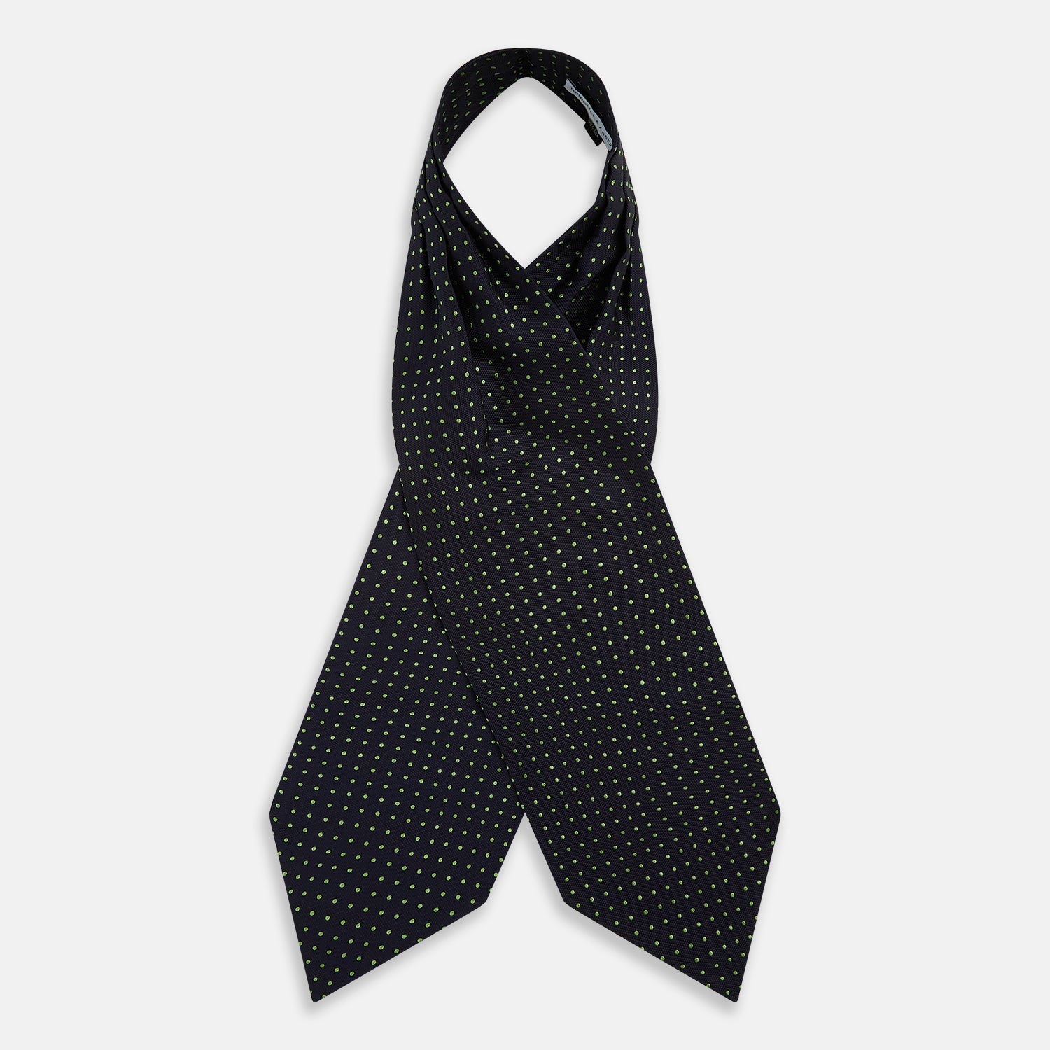 View 2 of product The Green Micro Dot and Navy Silk Cravat by Turnbull & Asser features fine green micro dots on navy silk, adding a refined touch to formalwear. Pair it with a matching pocket square for a cohesive, polished look.