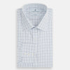 View 5 of product The Blue Overlay Grid Check Mayfair Shirt by Turnbull & Asser features a light blue and white grid check pattern with long sleeves and button-up design, making it a versatile wardrobe staple. Displayed on a plain white background.