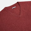 View 2 of product The Turnbull & Asser Burgundy Crew V-Neck Cashmere Jumper is a long-sleeve knitwear piece with ribbed cuffs, hem, and neckline, shown on a white background.