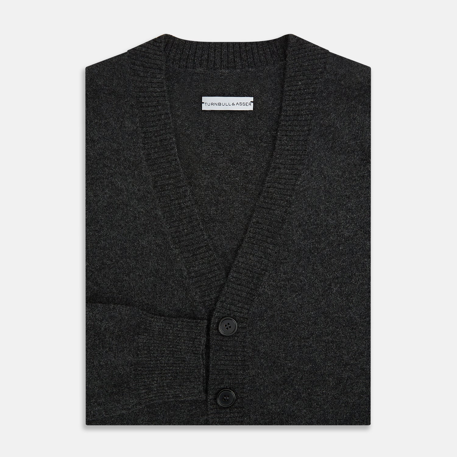 View 4 of product The Turnbull & Asser Dark Grey Melange Cashmere Cardigan features long sleeves, ribbed cuffs and hem, and two front pockets, shown on a plain white background.