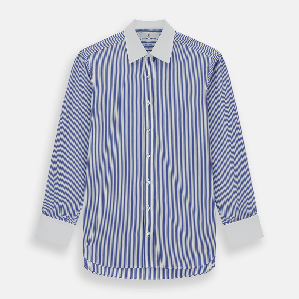 The Gekko Shirt by Turnbull & Asser features blue and white stripes with a white classic T&A collar and double cuffs, inspired by the Wall Street film. Shown on a plain white background.