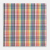 View 1 of product The Turnbull & Asser Hand Rolled Multi-coloured Grid Check Handkerchief features intersecting red, yellow, green, blue, and orange stripes on white—a vibrant and versatile gentleman’s accessory.