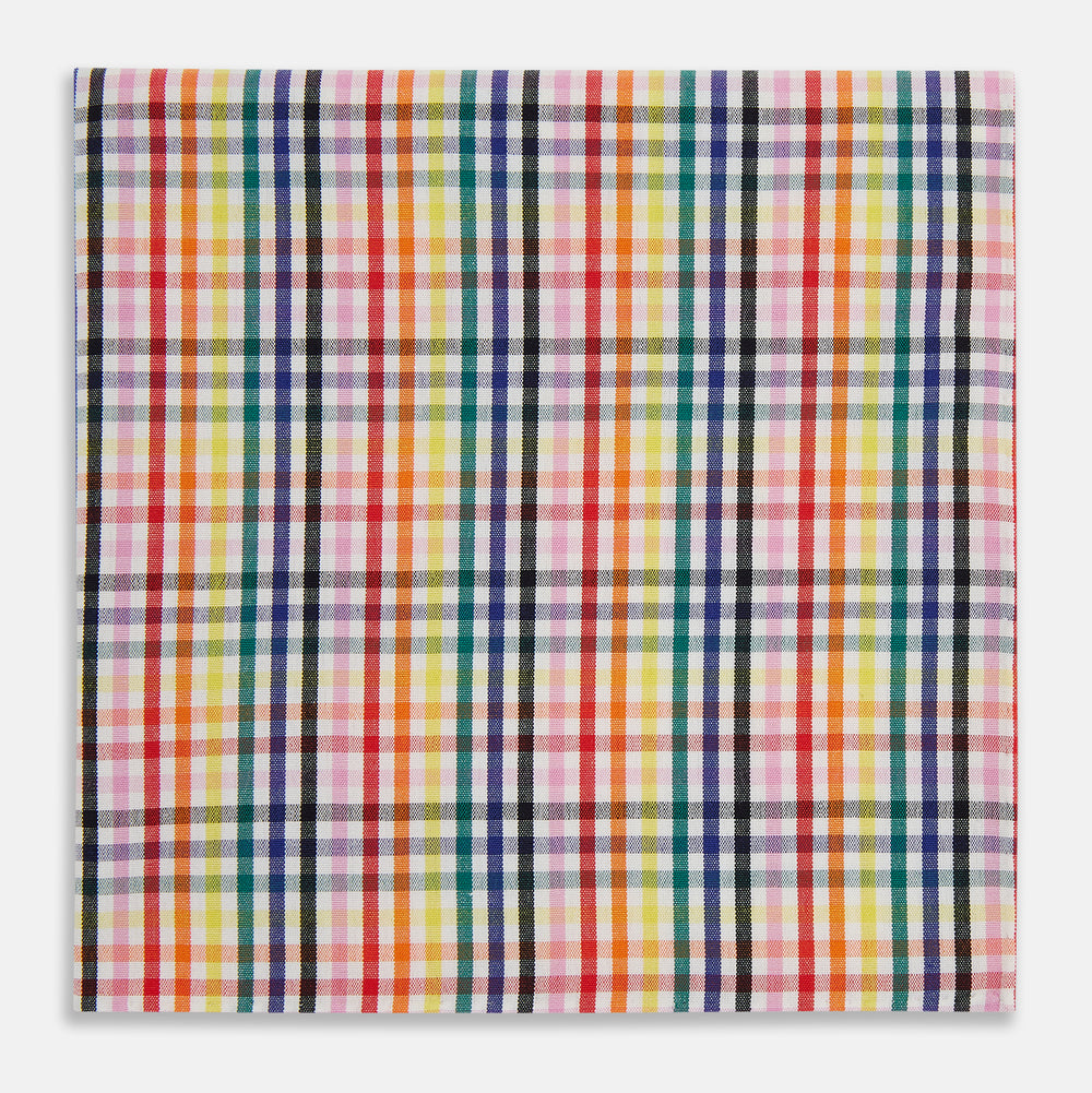 The Turnbull & Asser Hand Rolled Multi-coloured Grid Check Handkerchief features intersecting red, yellow, green, blue, and orange stripes on white—a vibrant and versatile gentleman’s accessory.