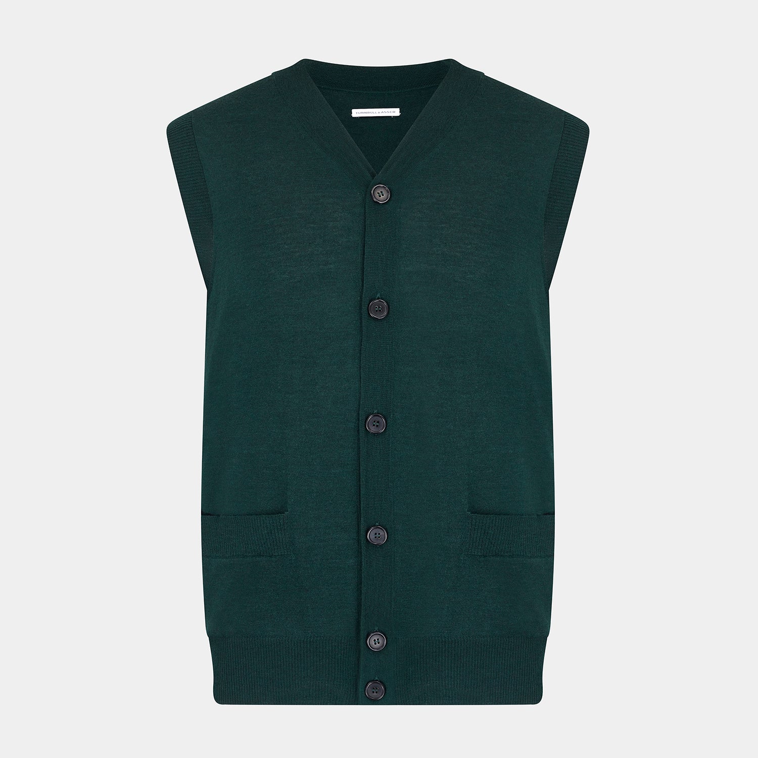 View 1 of product The Turnbull & Asser Petrol Green Fine Merino V-Neck Sleeveless Cardigan features two front pockets, a button-up design, and is shown against a plain white background.