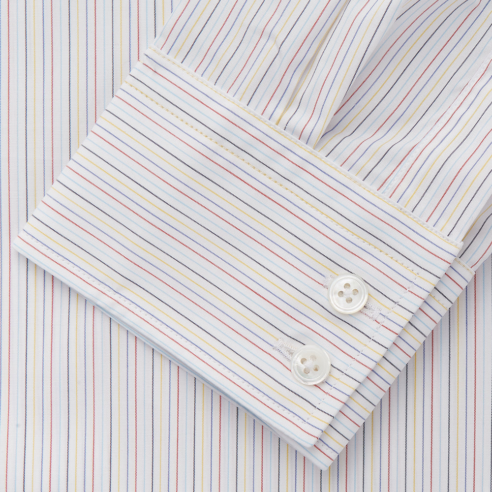 The Turnbull & Asser Red Multi Stripe Tailored Fit Shelton Shirt features subtle vertical stripes, a classic Kent collar, and buttoned cuffs, shown laid flat on a white background.