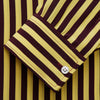 View 2 of product The Turnbull & Asser Yellow and Burgundy Candy Stripe Silk Weekend Fit Harold Shirt features long sleeves, a classic collar, white buttons, and a tailored design.
