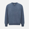 View 1 of product The Blue Melange Cashmere V-neck Jumper by Turnbull & Asser, featuring ribbed cuffs and hem, is part of our knitwear collection and shown against a white background.